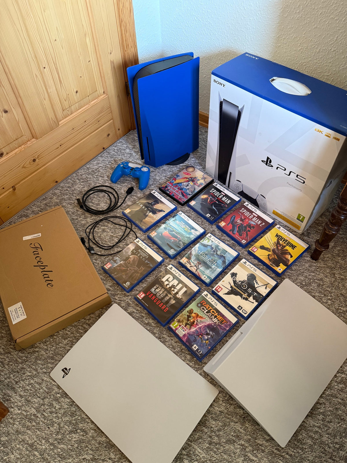 Pack Sony PlayStation 5 Disc Edition CFI-1016A avec 11 jeux et accessoires