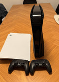 Sony PlayStation 5 Édition Disque + 2 DualSense noires et façades noir/blanc