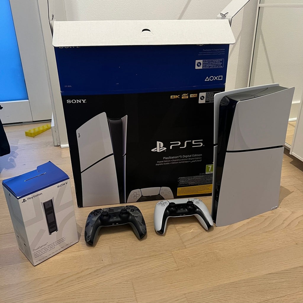 Pack Sony PS5 Digital Edition Slim + 2 manettes DualSense + station de recharge officielle