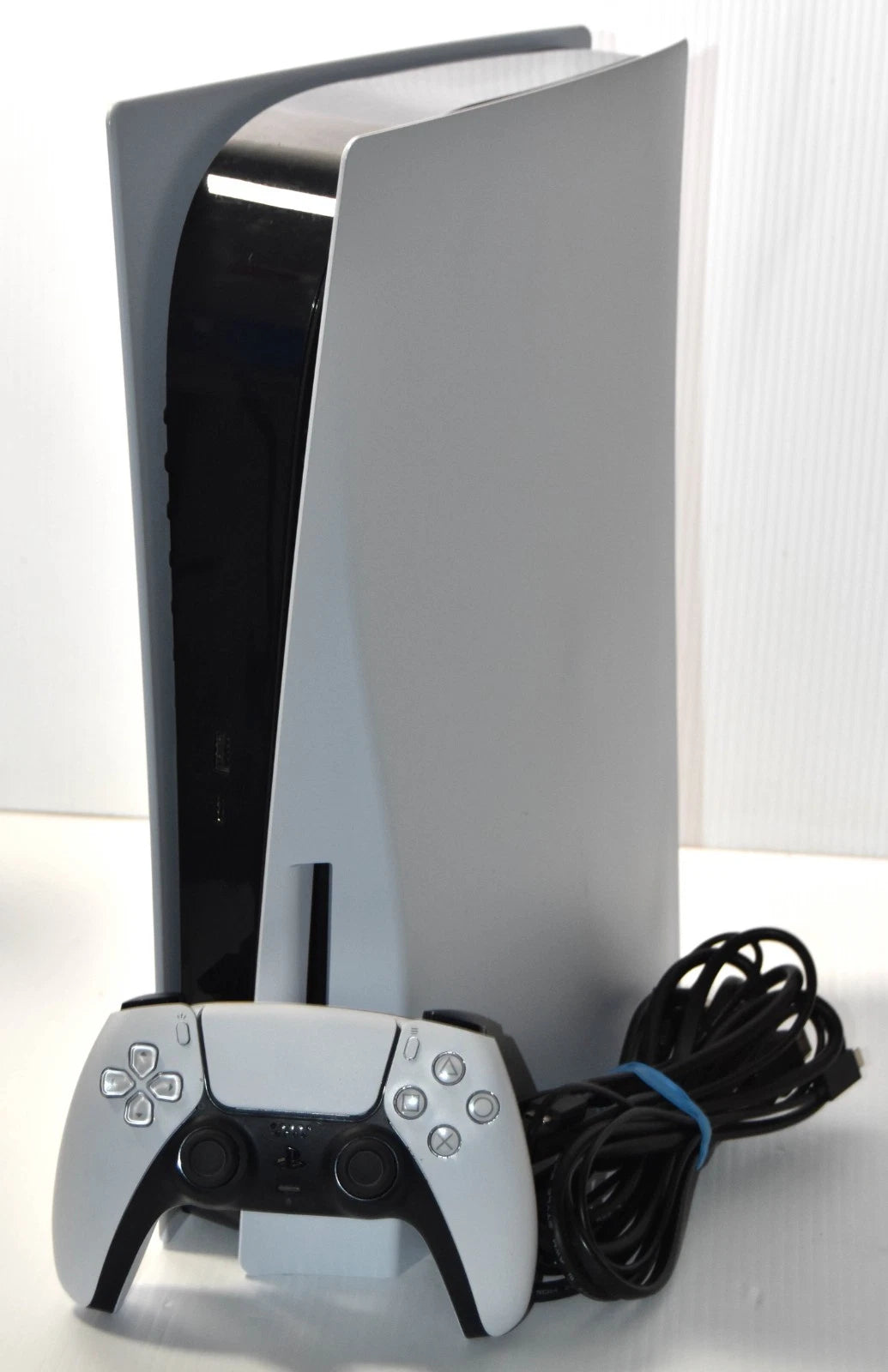 Sony PlayStation 5 (Édition Disque) + Manette DualSense – Reconditionnée / Occasion Garantie
