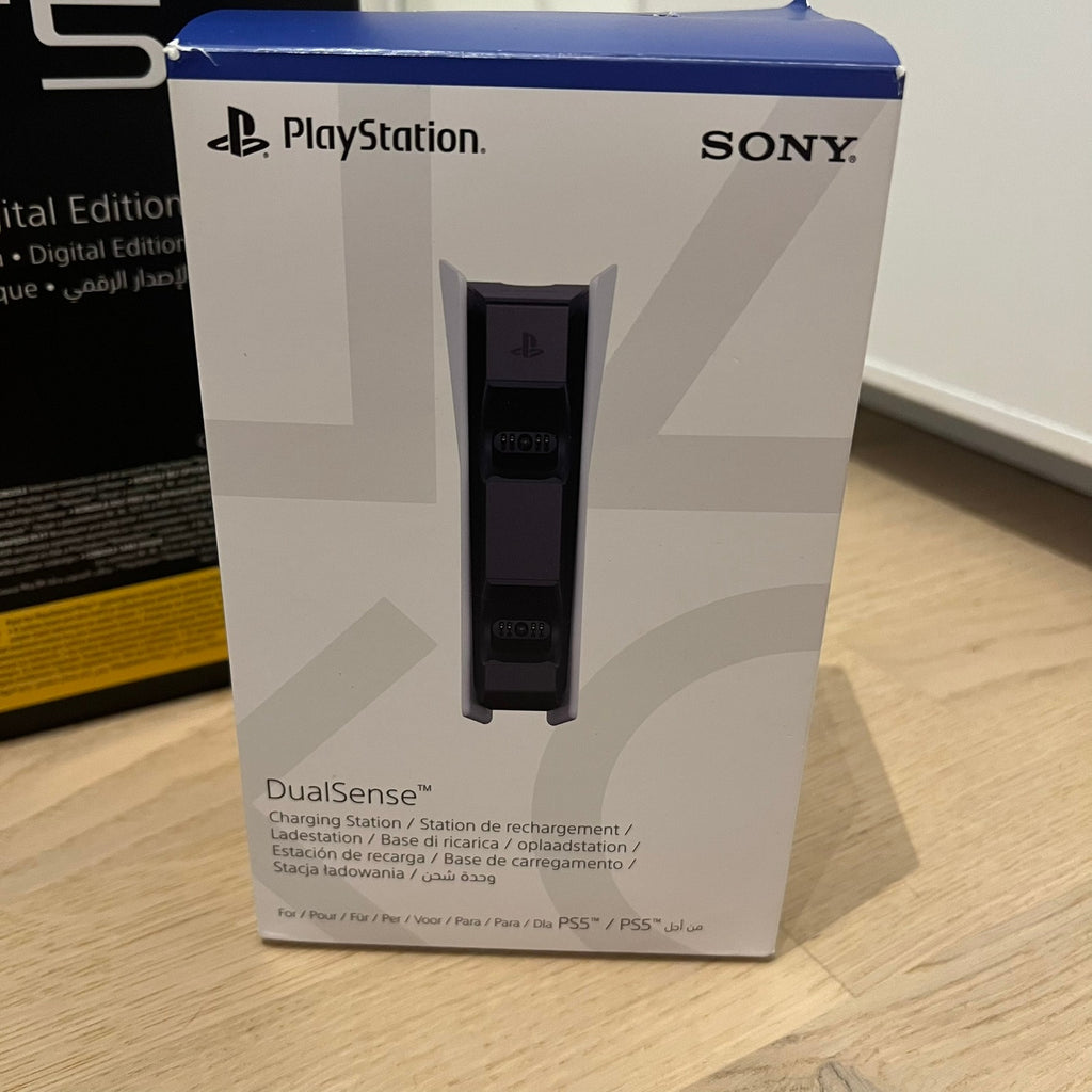 Pack Sony PS5 Digital Edition Slim + 2 manettes DualSense + station de recharge officielle